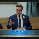 Brad Trivers speaks in the legislative assembly of PEI asking questions about building on private roads